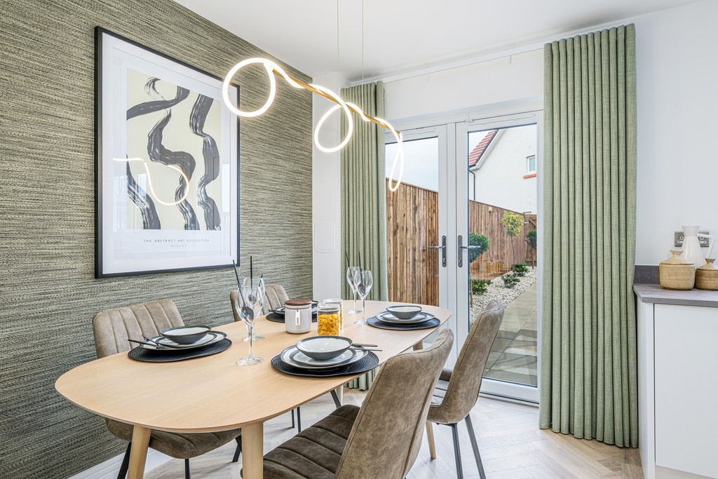 3 bedroom showhome | open plan kitchen, dining, and family area with French doors to rear garden