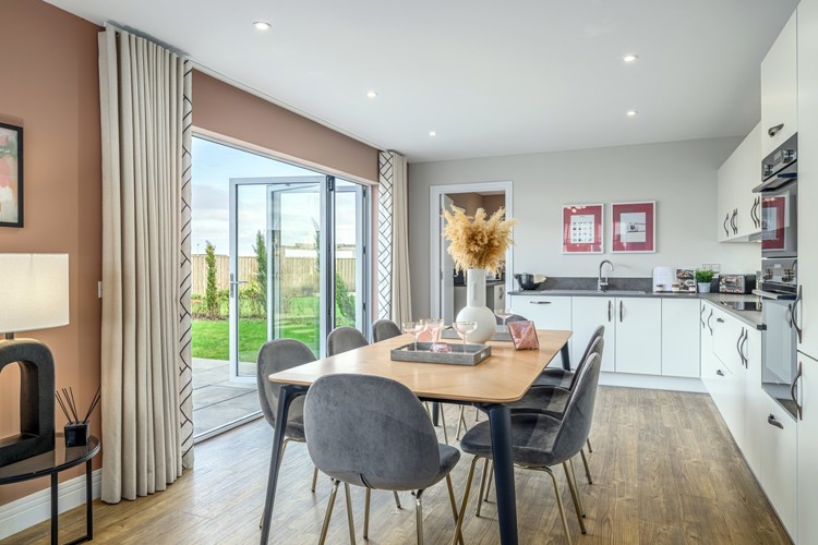 4 bedroom showhome | open plan kitchen, dining, and family area