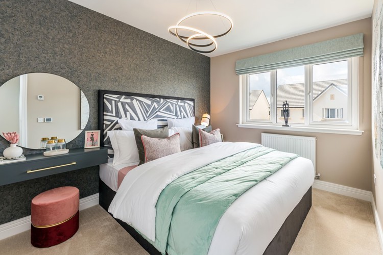 3 bedroom showhome | light-filled generous bedroom with fitted wardrobes