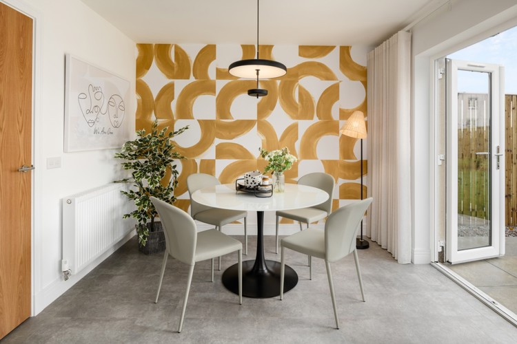 3 bedroom showhome | open plan kitchen and dining area with French doors to rear garden