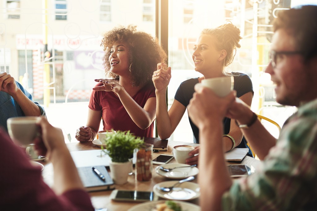 Friends dining out | Cala homes for sale