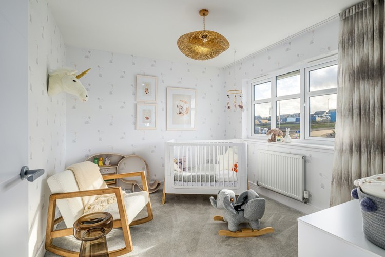 Bryce Bedroom 3 baby room with cot and rocking chair 