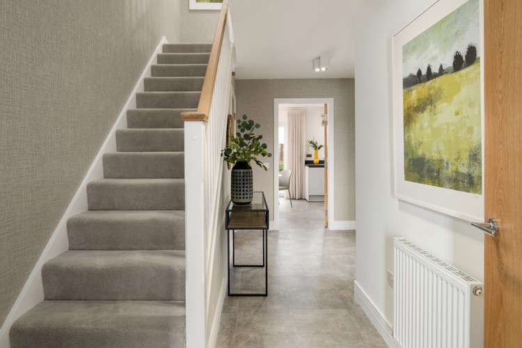 3 bedroom showhome | welcoming entrance hallway with cloakroom and access to lounge