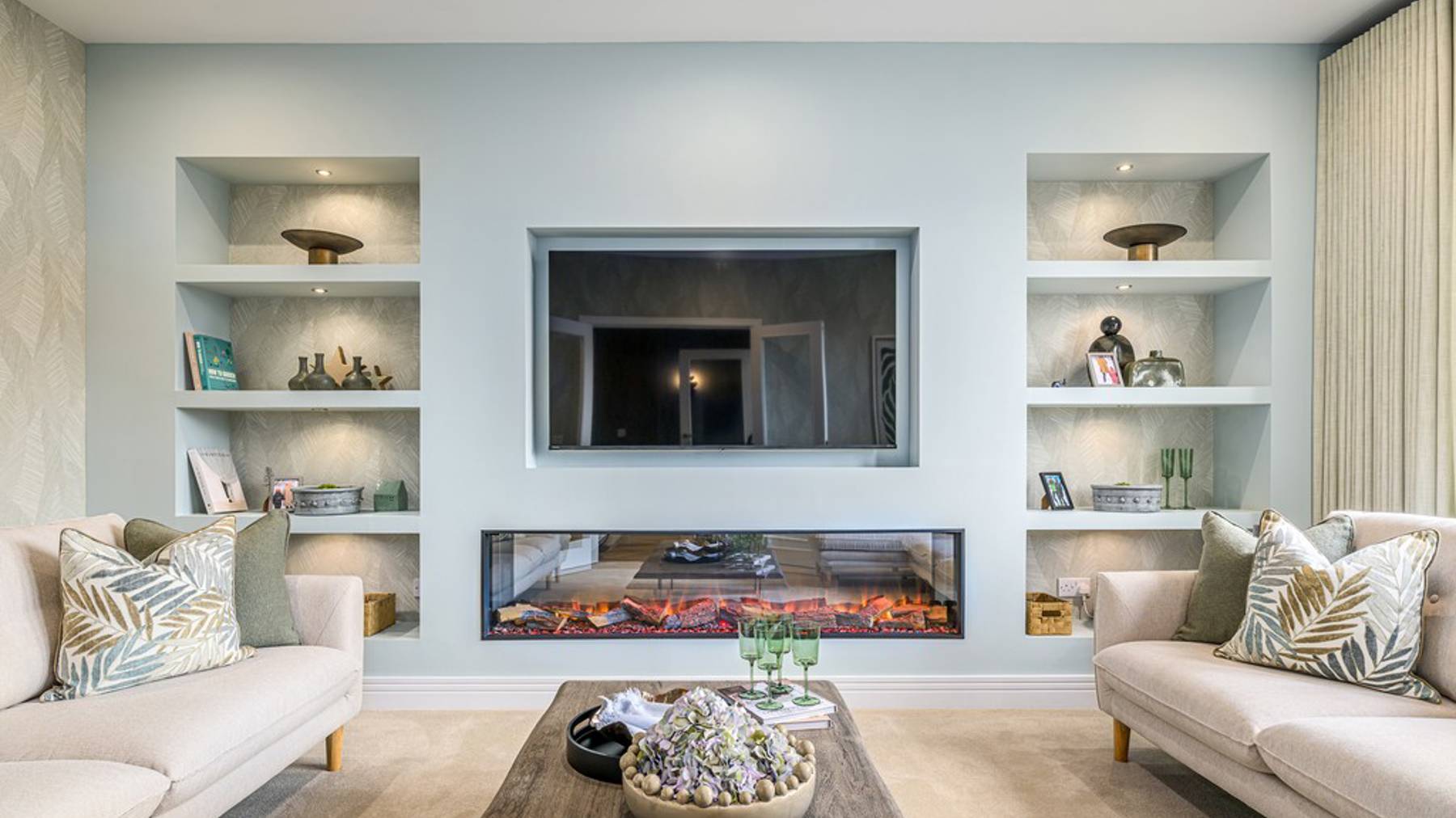 5 bedroom showhome | formal and cosy lounge with fireplace 