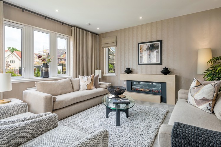 5 bedroom showhome | formal lounge with large windows and elegant décor, ideal for relaxing or entertaining