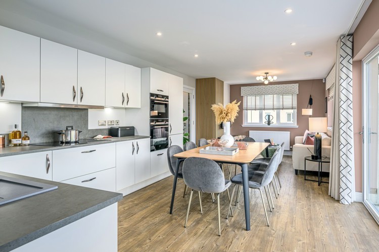 4 bedroom showhome | open plan kitchen, dining, and family area