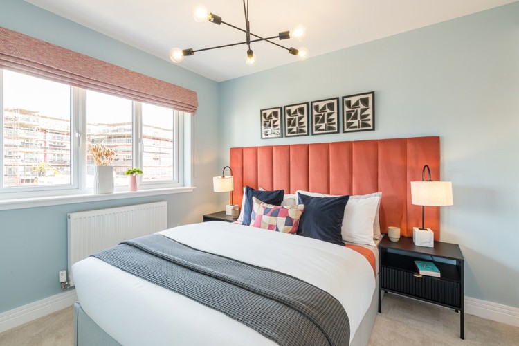 3 bedroom showhome | light-filled generous bedroom with fitted wardrobes