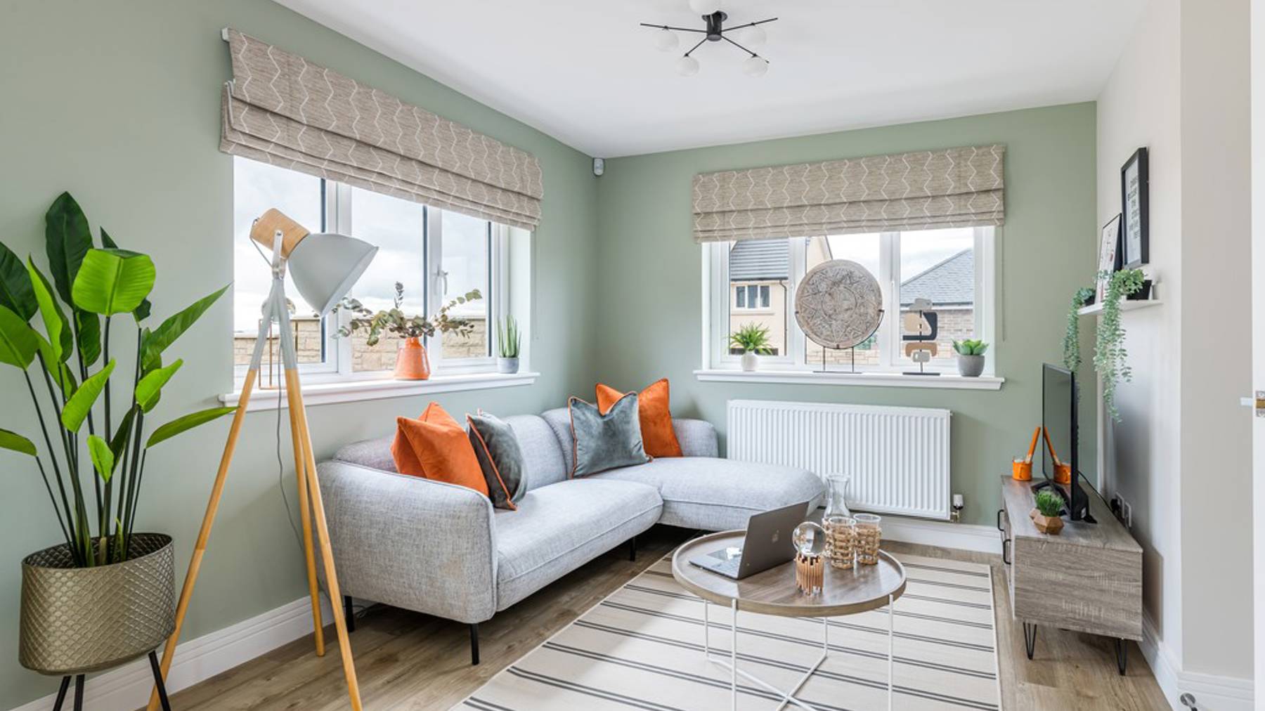 4 bedroom showhome | open plan kitchen, dining and family area with bi-fold doors to rear garden