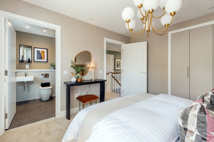 4 bedroom showhome | light-filled generous bedroom with fitted wardrobes